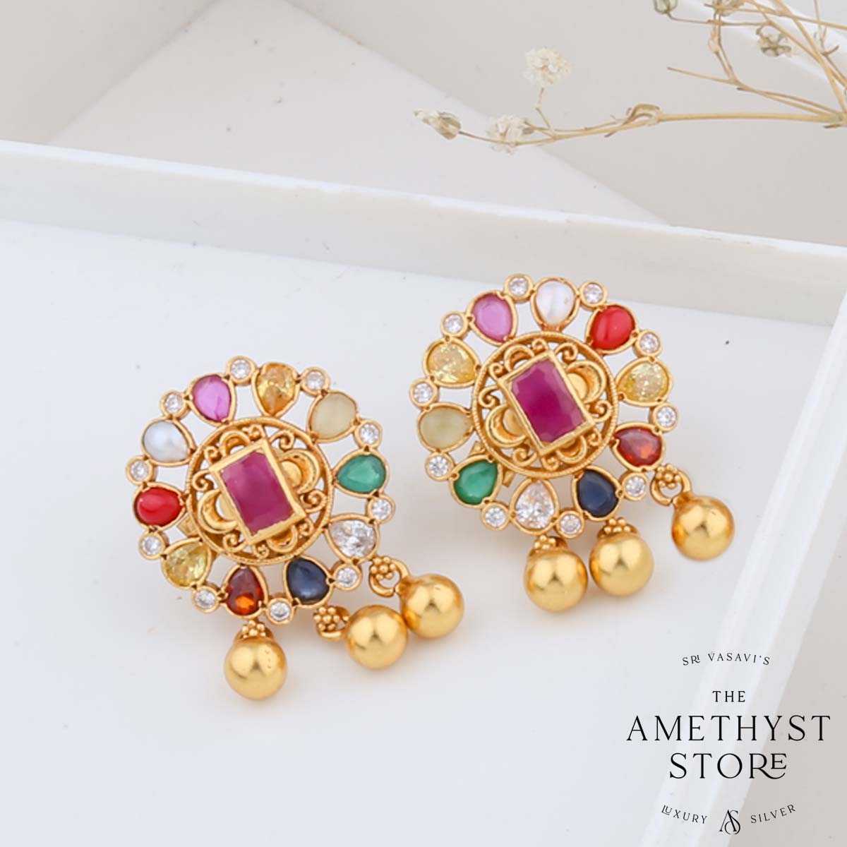 AD stone earrings online with leaf design - Swarnakshi Jewelry